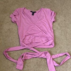 Cropped tie around shirt.